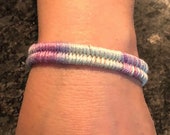 Hand dyed thread wrapped woven bracelet