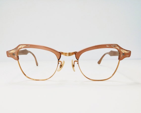 pink horn rimmed glasses