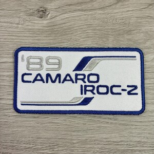 May include: A rustic wooden sign with the text "Welcome to our porch" in white lettering. The sign features a distressed finish and a simple, inviting design, perfect for outdoor decor.