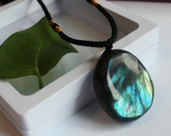 636 Labradorite pendant necklace a rounded polished stone of a varied weight of approx. 15-30 grams with a faux leather adjustable cordage.