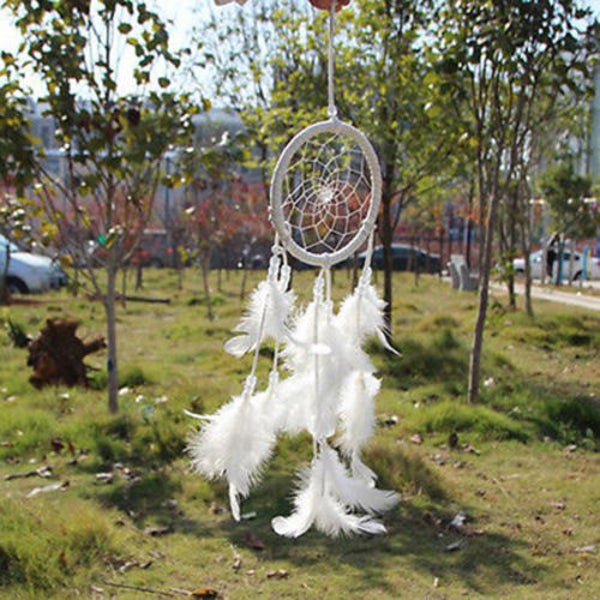 117 White dream catcher with white feathers hanging down