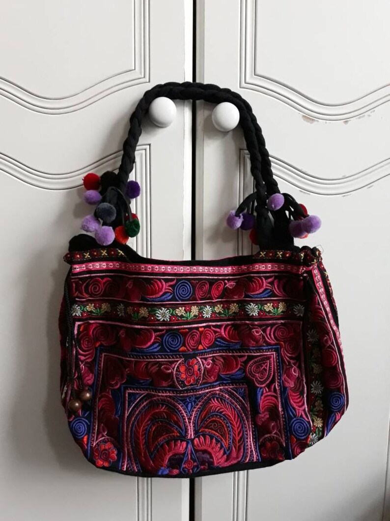 Vintage embroided floral hand shoulder bag with pom poms