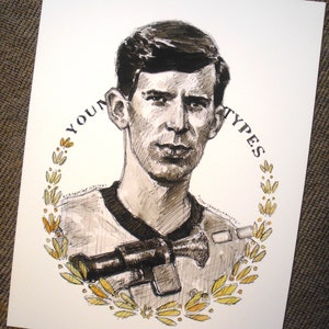 May include: Black and white ink drawing of a man with the words "YOUNG TYPES" in a circular design. The drawing has gold accents. The man is wearing a shirt with a black collar and a device around his neck.