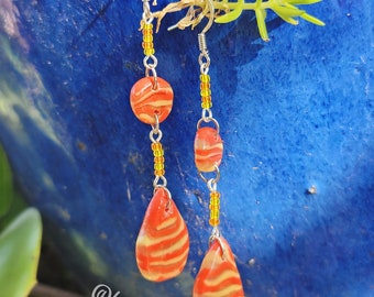 Marbled orange polymer clay and bead earrings