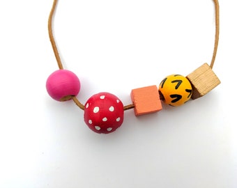 Wood bead necklace // warm colors, pink, orange, yellow, red