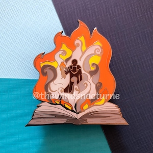 Broche de esmalte "From the Ashes" de Dragon Age com Hawke, o Campeão de Kirkwall