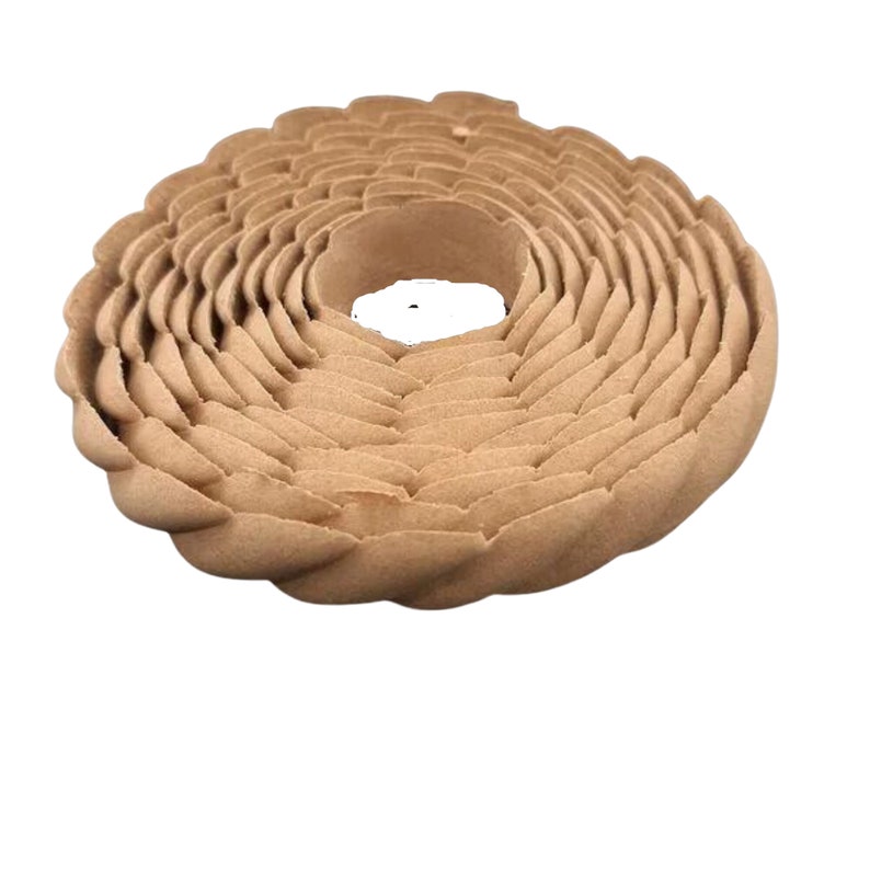May include: A brown, coiled, decorative trim made of a textured material. The trim is shaped like a flower with multiple layers.