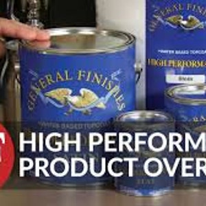 May include: A set of General Finishes High Performance water-based polyurethane paint cans in various sizes. The cans are blue with a white eagle logo and the text "General Finishes" and "High Performance" printed on them. The largest can is labeled "Black".