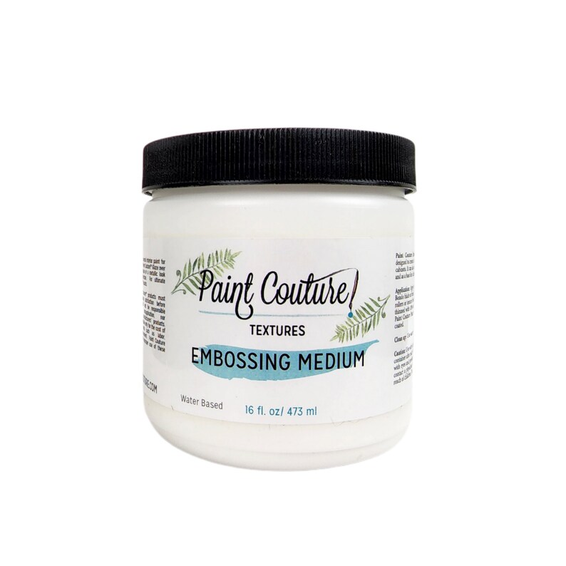 May include: A white plastic jar with a black lid containing Paint Couture Textures Embossing Medium. The jar is labeled "Water Based" and "16 fl. oz/473 ml".