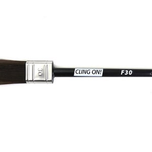 May include: A black paint brush with a silver ferrule and black handle. The handle has the text "CLING ON!" and "F30" printed on it.