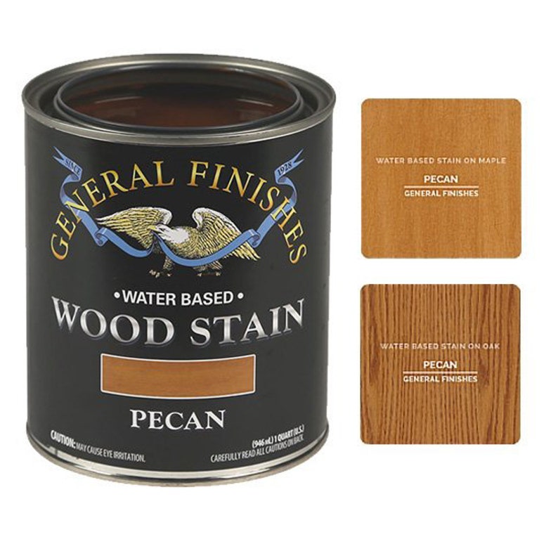 May include: A can of General Finishes water-based wood stain in the color Pecan. The can is labeled with the company logo and the words "Water Based Wood Stain" and "Pecan".