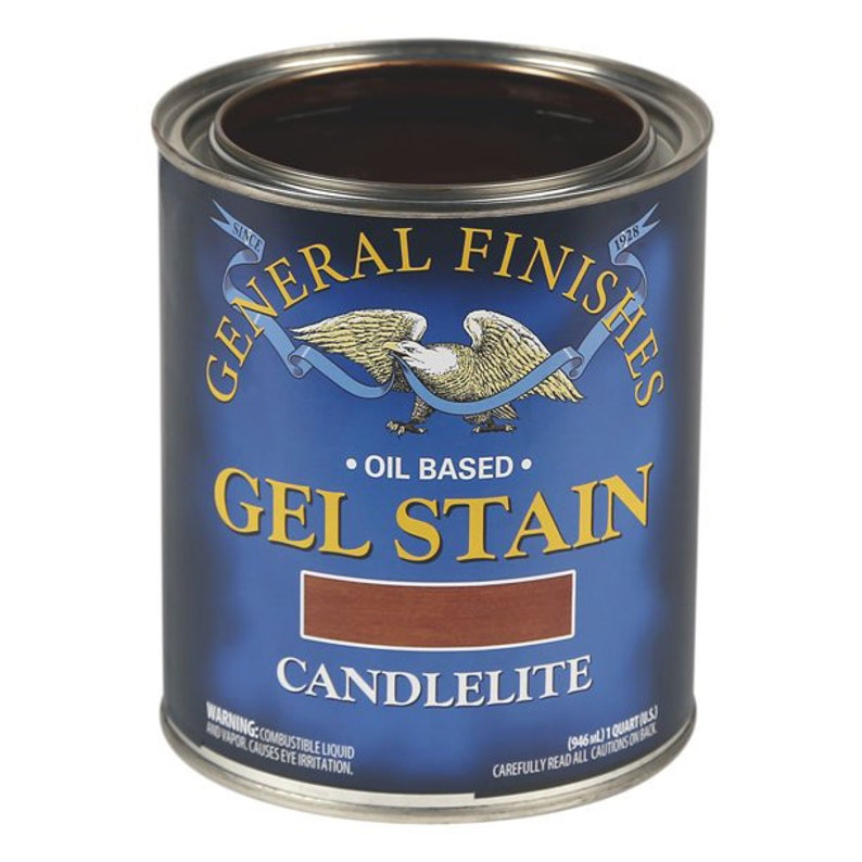 May include: A blue can of General Finishes oil-based gel stain in the color Candlelite. The can is labeled with the company logo and the text "General Finishes" and "Gel Stain".