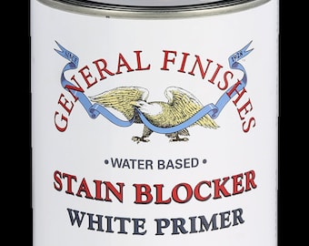 May include: A white can of General Finishes Stain Blocker White Primer, a water-based primer for wood. The can is labeled with the brand name, product name, and size: (946 mL) 1 Quart (US). A warning label states: "Causes eye and respiratory tract irritation."