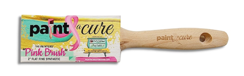 May include: A pink paint brush with a wooden handle. The brush is labelled "The Painters' "Pink Brush" 2" Flat Fine Synthetic" and has the words "paint a cure" on the handle.