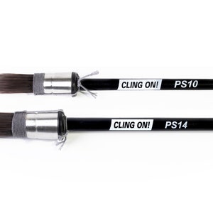 May include: Two black paint brushes with white lettering that says "CLING ON!" and "PS10" or "PS14".