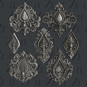 May include: A collection of ornate, silver-colored decorative elements with intricate scrollwork and symmetrical designs. The pieces vary in shape, including teardrop and diamond forms, and feature detailed textures and patterns. The background is a dark gray.