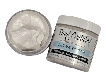 May include: A jar of white metallic stencil paste labeled "Paint Couture" with the text "Saltwater Pearl" and "Smooth and Creamy with Shimmer". The jar is 4 fluid ounces or 118 milliliters.
