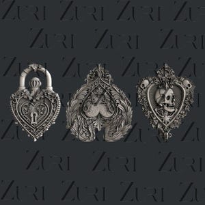 May include: Three ornate silver-colored pendants, each with a different design. The first is a heart-shaped padlock with a keyhole, the second is a spade playing card with intricate details, and the third is a heart with a skull and crossbones.