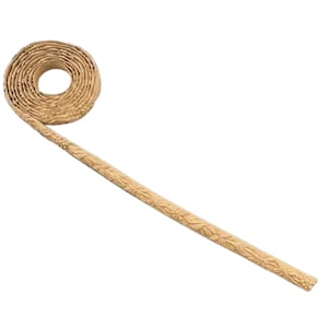 May include: A roll of beige decorative trim with a floral pattern. The trim is coiled and has a long length extending from the coil.