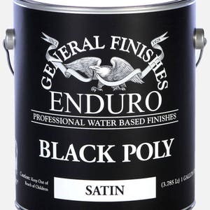 May include: A gallon can of General Finishes Enduro Black Poly Satin water-based finish. The can is black with a white label and features the General Finishes logo with an eagle and the text "Since 1928".