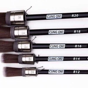 May include: Five black handled paint brushes with silver ferrules and brown bristles. The handles are labeled "CLING ON!" and "R20", "R18", "R16", "R14", and "R12".