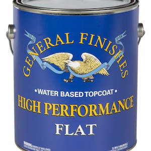 May include: A blue paint can with a white eagle logo and the text "General Finishes Since 1928". The can is labeled "Water Based Topcoat" and "High Performance Flat".
