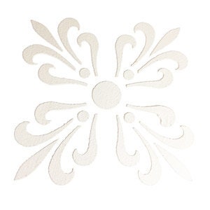May include: White decorative stencil with a butterfly design. The stencil features a central circle with four smaller circles around it, and intricate swirling patterns on each side.