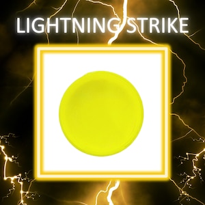 May include: A bright yellow circle with a slightly raised center, resembling a button or a small disc. The circle is set against a white background.