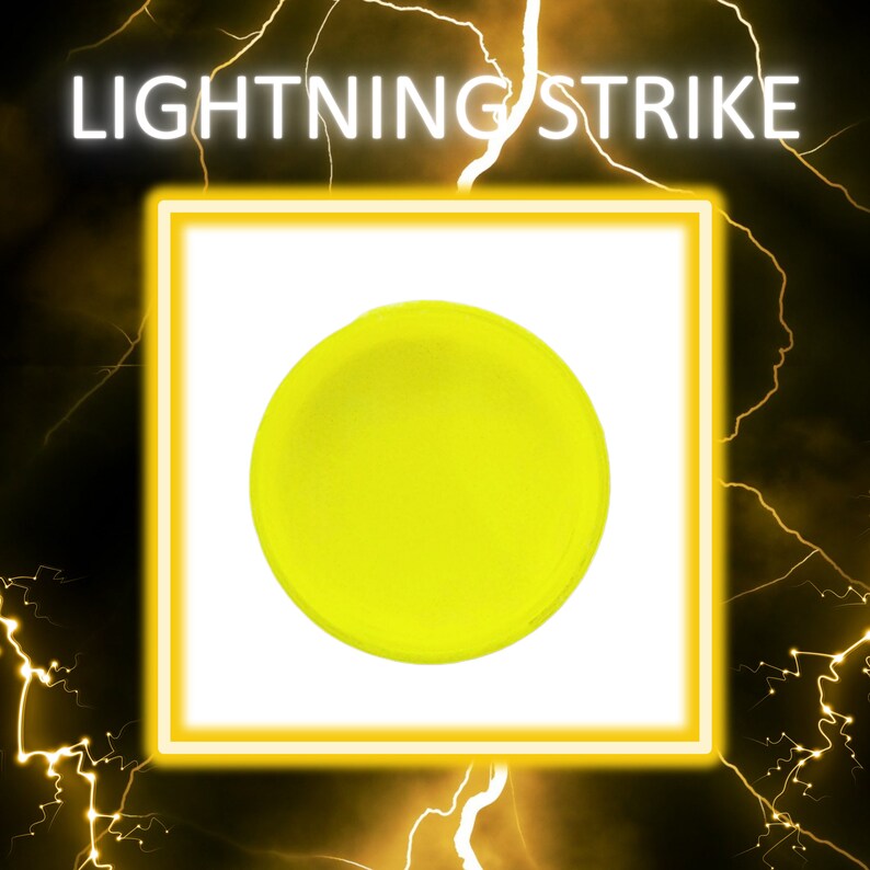 May include: A bright yellow circle with a slightly raised center, resembling a button or a small disc. The circle is set against a white background.