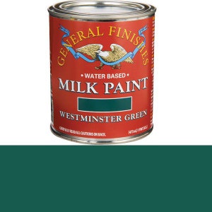 May include: A red and white can of General Finishes Milk Paint in the color Westminster Green. The can is labeled with the brand name and the color name.