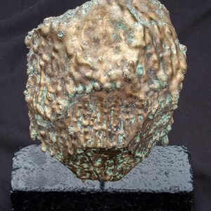 1/2 bronze egg sculpture mask image 3