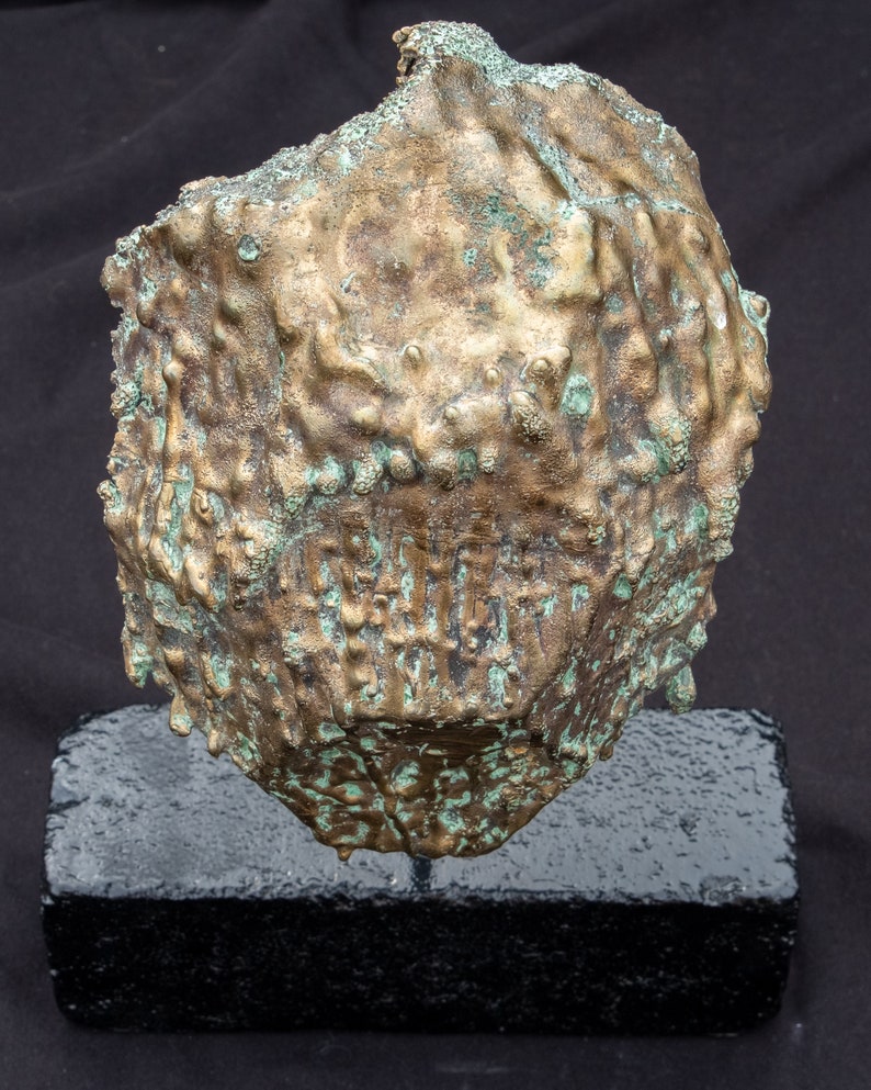 1/2 bronze egg sculpture mask image 3