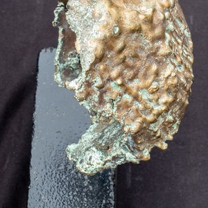 1/2 bronze egg sculpture mask image 2