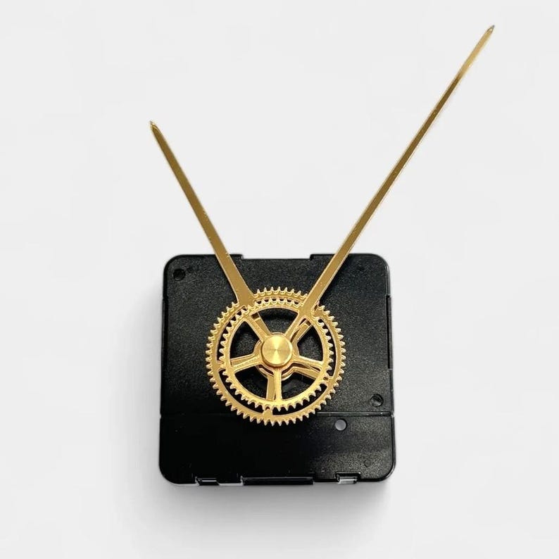 May include: A clock movement with a black square base, gold-colored gear, and gold-colored hands. The hands are long and thin, and the gear is circular with intricate teeth. The clock movement is designed for DIY clock projects.