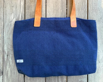 Handmade blue loom bag with leather handles