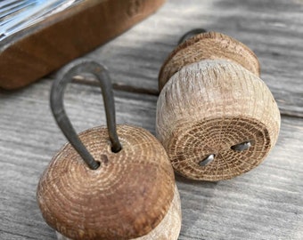 Hand carved porcini keyrings made from dark oak wood with distinctive wood vein patterns