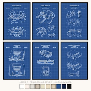 May include: A set of six blue grid-patterned prints featuring white technical patent illustrations of vintage gaming controllers, a game console, a handheld console, and a video game control unit with detailed labels and patent numbers.