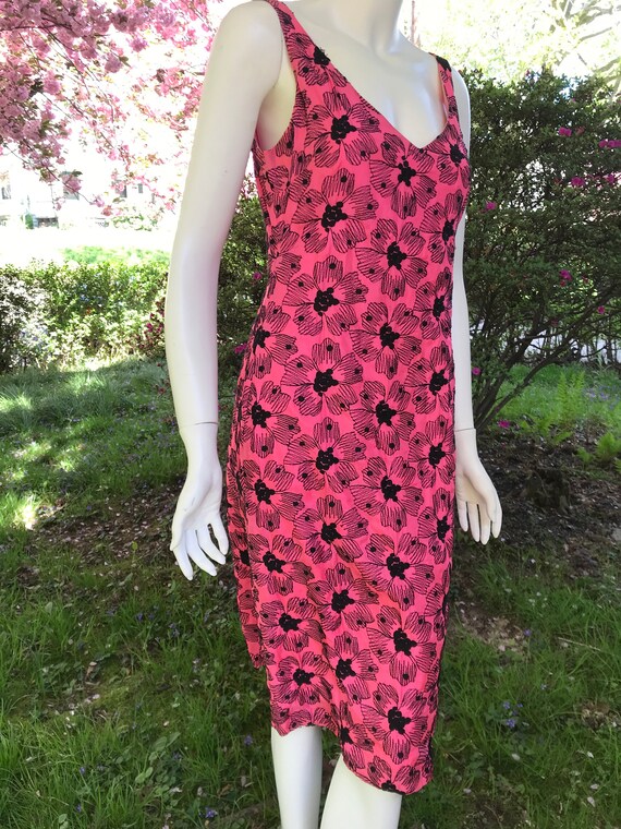 black dress with large pink flowers