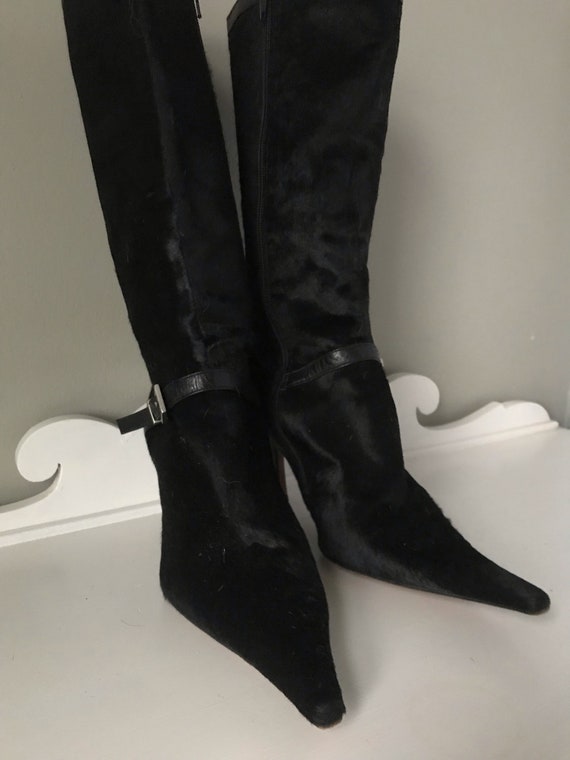 pointy black boots