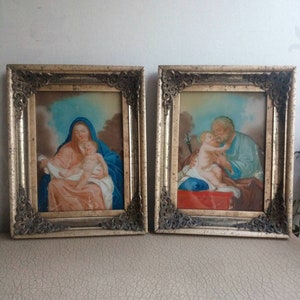 Set of antique small original paintings Mary and Joseph 19th century with reverse painted glass and gold colored frame with metal ornament