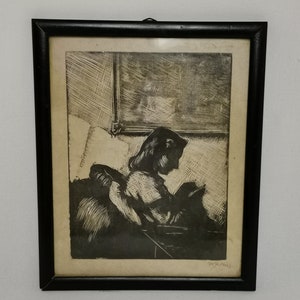 Antique black and white print woman with needlework or book in frame 1920s Antique etching woman Antique engraving young lady Woman reading