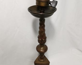 Antique brass table lamp with an 19th-century candlestick | Electrified copper candlestick with an angel's face