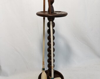 Antique table top wood pipe rack with 2 Gouda clay pipes Goedewaagen Holland 1900s Antique woodturning pipe rack with long clay pipes