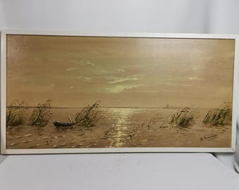 フレーム 1970 年代の日没に手漕ぎボートのあるビンテージ オリジナル