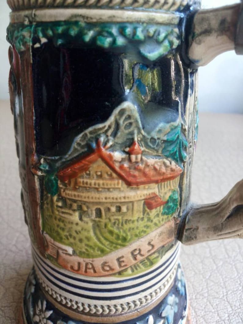 Vintage musical beer stein DBGM with music box Jagers Abschied 1960s Earthenware beer mug Edelweiss Vintage German beer mug with music