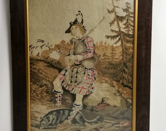 Antique embroidery musician bagpiper with dog in landscape in oak frame 1910s Victorian framed needlepoint young man in nature Country house