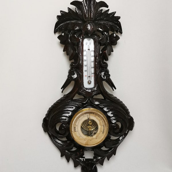 Antique weather station Dutch language hand carved flower leaves and storks 1910s Wood carvings barometer with storks birds gloss