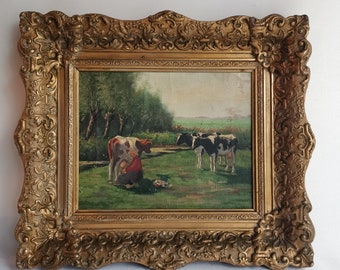Petit paysage de polder de peinture à l’huile originale antique avec des vaches et un fermier laitier dans un cadre ornemental des années 1940 Huile sur toile