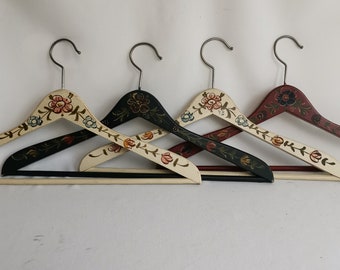 Vintage set of Hindeloopen clothes hangers 4 pieces in red green and white 1980s Hand painted coat hangers with floral folk art painting