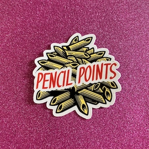 May include: A white sticker with a pile of yellow pasta shapes and the text "PENCIL POINTS" in red.